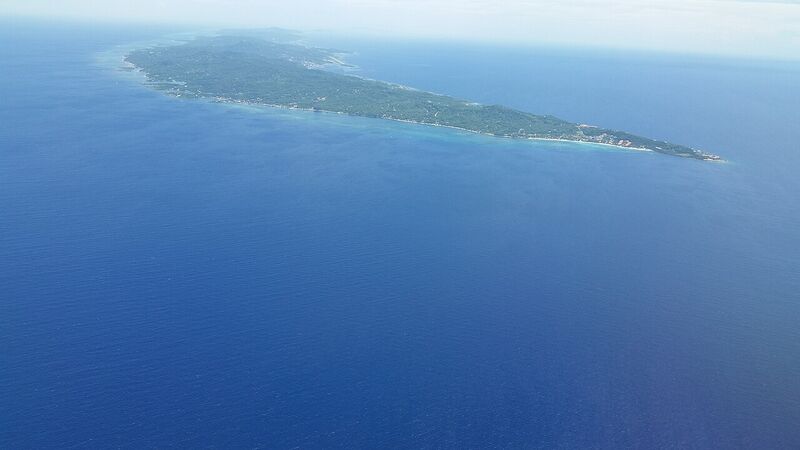 Roatan looking northwest with West Bay on the right and Coxen Hole and Manuel Galvez airport in the upper middle